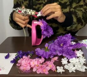 3 unique easy ways to make cute diy slides for summer, Gluing the flowers with a hot glue gun