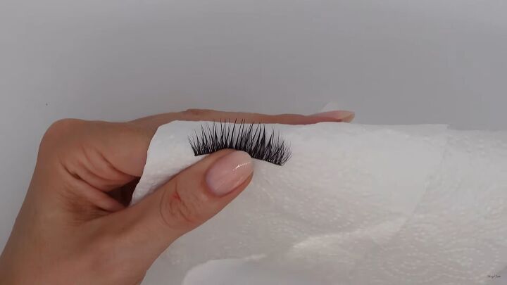 how to clean false lashes easily safely so you can reuse them, Drying the lashes on a paper towel