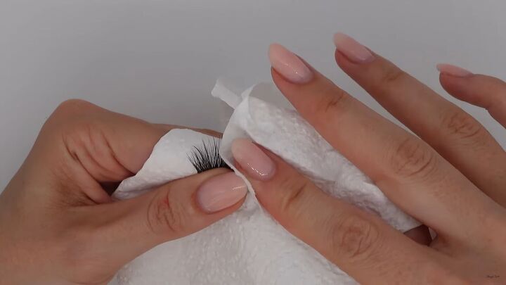how to clean false lashes easily safely so you can reuse them, Dabbing the lashes to dry them