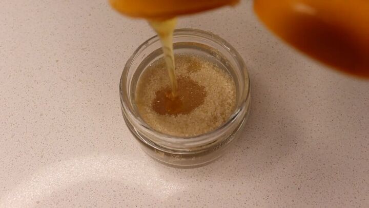 how to make a gentle diy sugar scrub for your face in 5 easy steps, Adding raw honey to the face scrub recipe