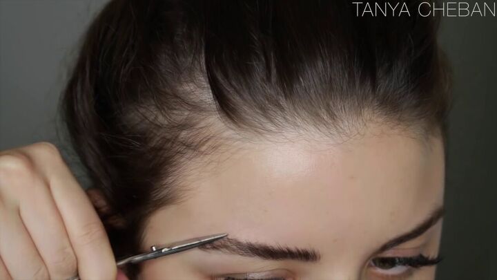 are your eyebrows getting a little unruly try this easy brow tutorial, Trimming the eyebrow hairs