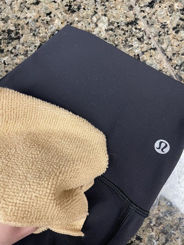 how to wash lulus and keep them in the best shape possible, towel pretreating stain on Lululemon leggings