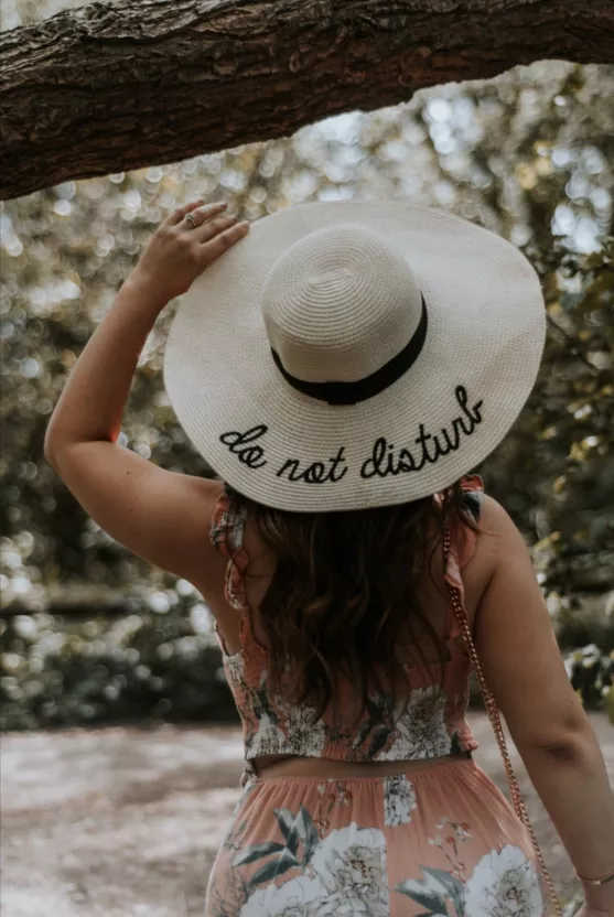 how to reshape a straw hat in a few simple steps, straw beach hat with do not disturb on brim
