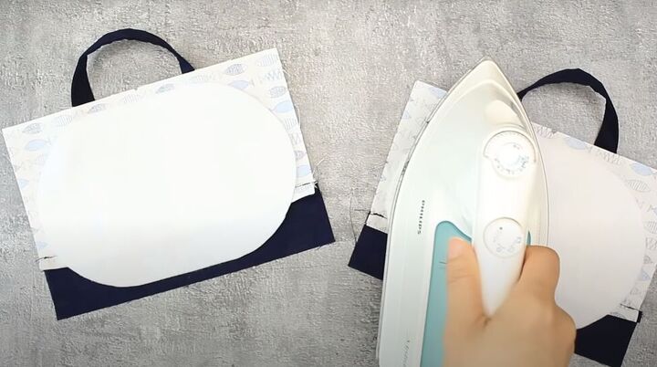 how to make a mini purse with a zipper lining in 7 simple steps, Ironing the interfacing