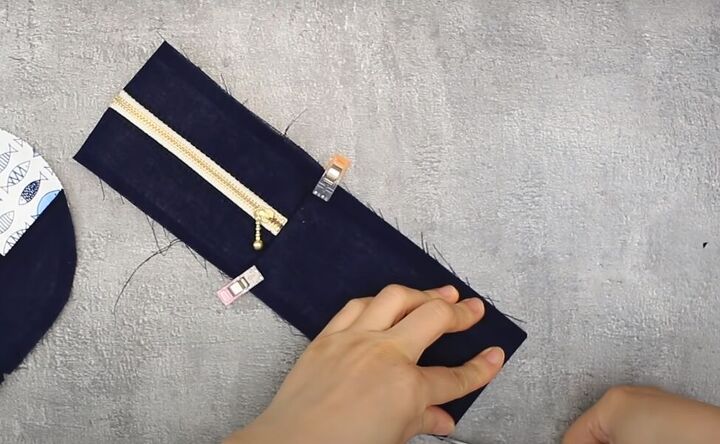 how to make a mini purse with a zipper lining in 7 simple steps, Folding the zippered tube and snipping