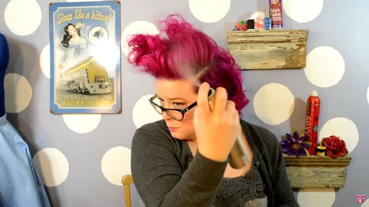 how to do a super cute vintage poodle updo in 7 simple steps, Spraying hair with hairspray