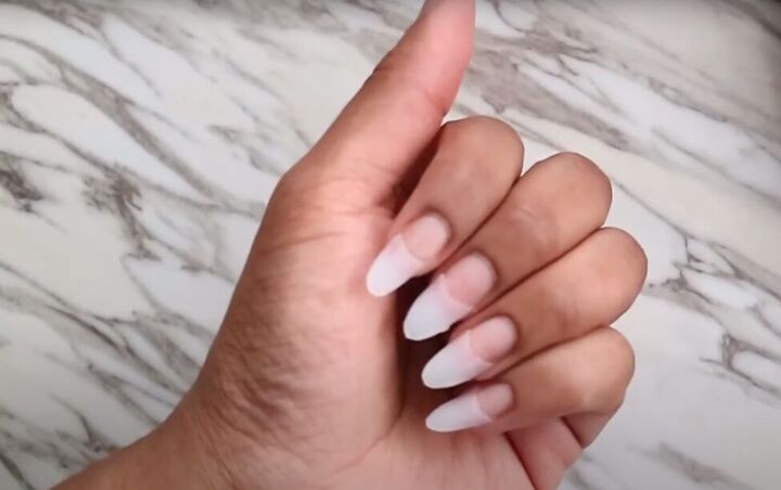 how to do diy polygel nails using nail tips from the dollar tree, Filing nail tips to the desired shape