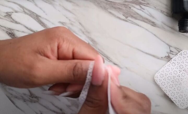 how to do diy polygel nails using nail tips from the dollar tree, Wiping away the sticky layer