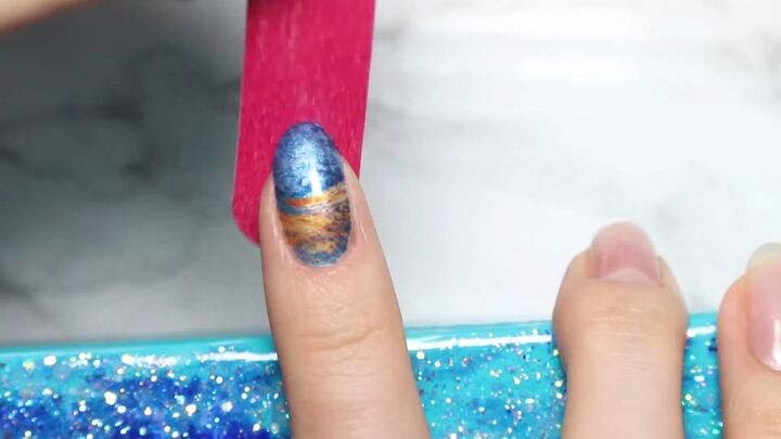 how to easily apply remove real polish nail wraps at home, Filing the back of the nail