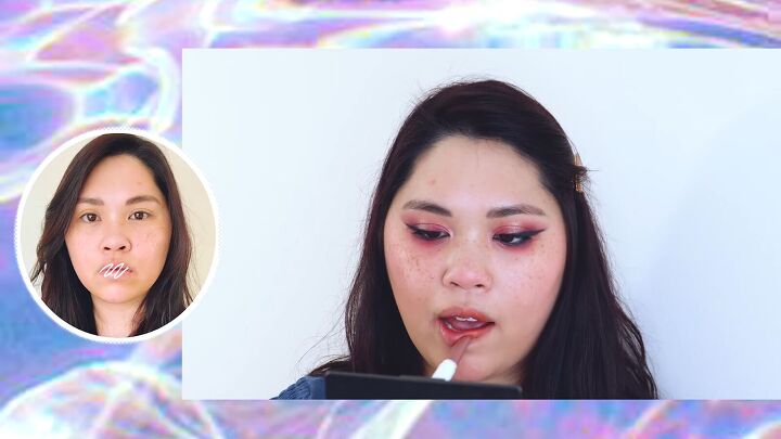 how to do sexy dramatic fox eye makeup with pops of pink purple, Applying a nude brown lipstick