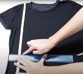 how to cut a t shirt into a crop top in 4 super cute ways, Measuring where to crop the t shirt