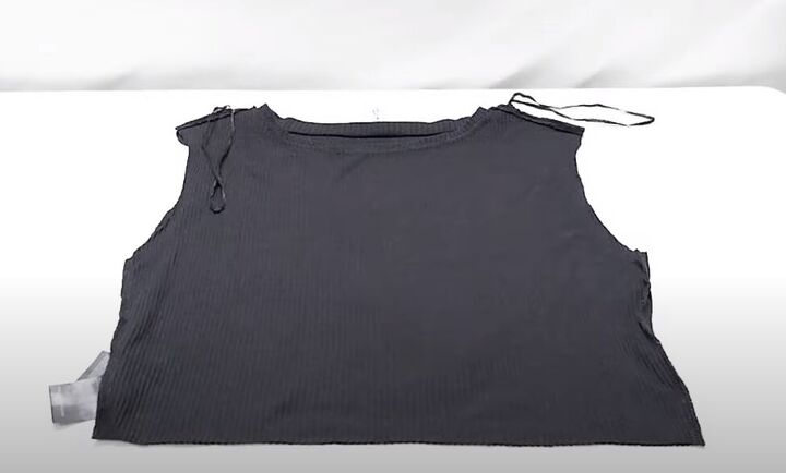 how to cut a t shirt into a crop top in 4 super cute ways, Cutting off the sleeves of the t shirt