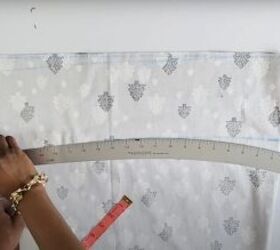 how to make a maxi skirt with slits pockets perfect for summer, Using a curved ruler to make the waistband