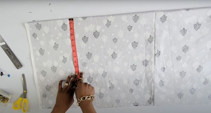 how to make an off the shoulder crop top in 5 simple steps, Folding and measuring the fabric