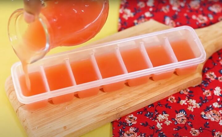 how to make soothing diy ice cubes for your face 4 easy recipes, Pouring the tomato mixture into an ice cube tray