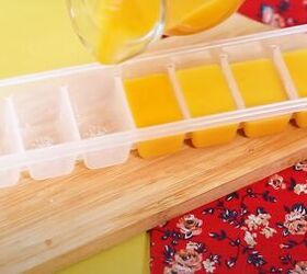 how to make soothing diy ice cubes for your face 4 easy recipes, Pouring the turmeric mixture into an ice cube tray