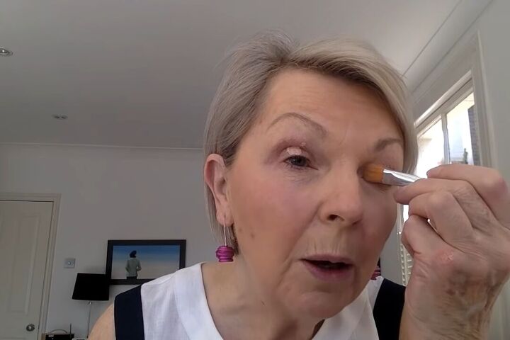how to do light summer eye makeup over 60 in 8 simple steps, Applying primer to the eyes