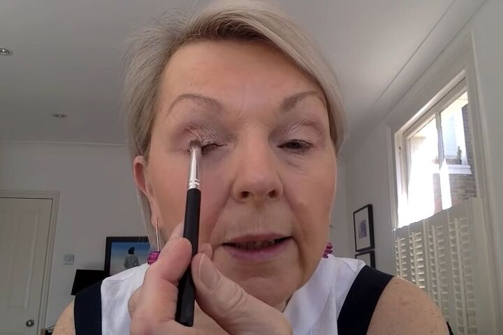 how to do light summer eye makeup over 60 in 8 simple steps, Applying a rose gold eyeshadow