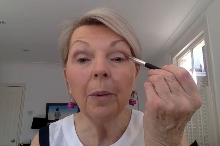 how to do light summer eye makeup over 60 in 8 simple steps, Applying a taupe eyeshadow