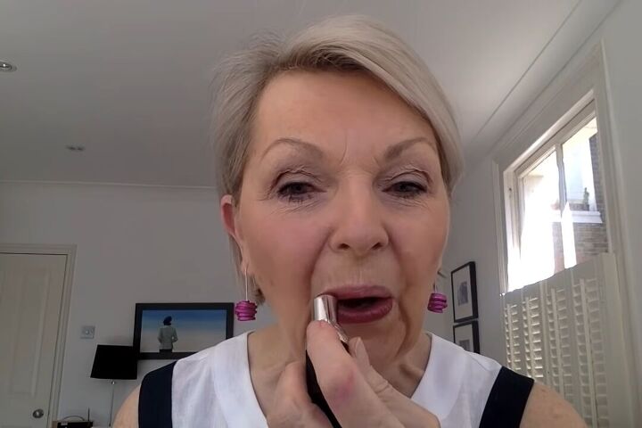 how to do light summer eye makeup over 60 in 8 simple steps, Applying lipstick to finish the look