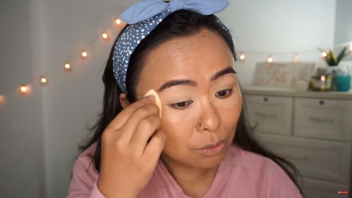 8 viral trending makeup hacks you need to try, Blending out the concealer with a makeup sponge
