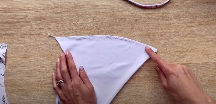 how to make your own bikini by copying one you already have, Sewing a basting stitch across the serged bottom