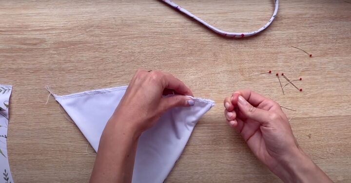 how to make your own bikini by copying one you already have, Pulling on the basting stitch to gather the bottom