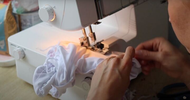 how to make your own bikini by copying one you already have, Serging elastic across the waistband