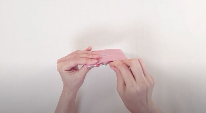 how to make a cute diy cardholder wallet quickly easily, Hand sewing the unsewn fabric closed
