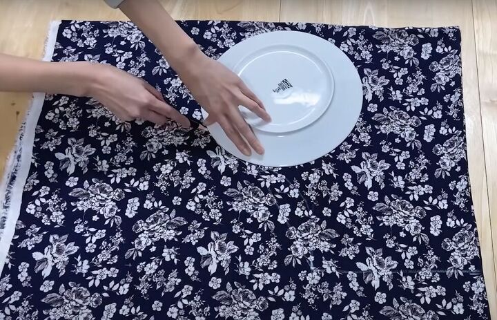 how to sew a beautiful diy butterfly top with flowy tie sleeves, Using a plate to mark the curves