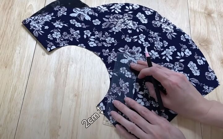 how to sew a beautiful diy butterfly top with flowy tie sleeves, Cutting an angle on the interfacing