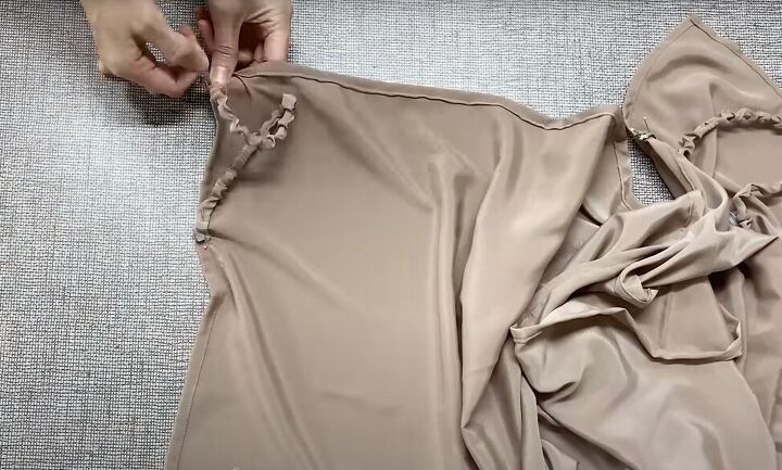 how to make a diy wrap dress with a cute ruffle, Sewing the strap on the seam allowance