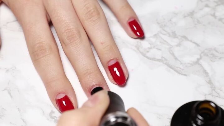 how to do glam dita von teese nails with a red half moon manicure, Dita von Teese half moon nails