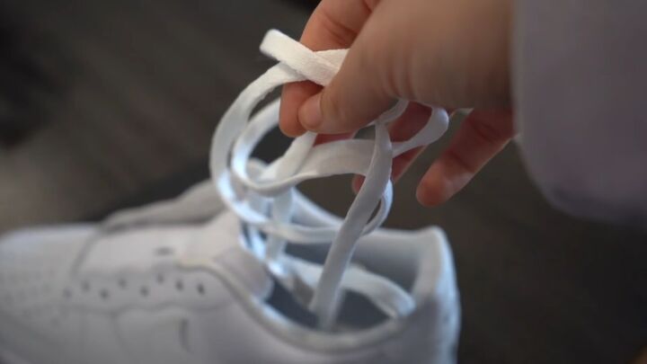how to make cool diy ombre sneakers using the dip dye method, Removing the shoelaces