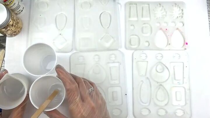 how to make resin earrings with molds cute white gold jewelry, Dividing the mixture into three cups