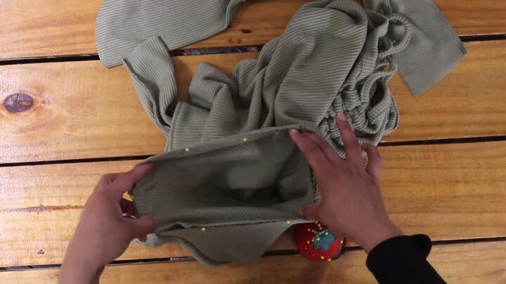 how to make a diy drawstring top that hits all this season s trends, Inserting the sleeve into the armhole