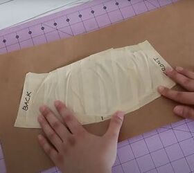 how to copy a hat pattern from an existing hat using masking tape, Transferring the tape pattern onto paper