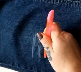 how to make a diy distress tool for jeans out of a bbq cleaning brush, Using an X ACTO knife to cut through the marks