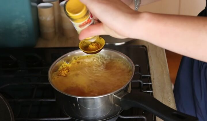 how to dye hair blonde get natural balayage with turmeric hair dye, Boiling turmeric to make the dye