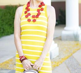 Pretty woman ethnicity jewelry turban yellow dress posing Stock Photo by  ©ShotStudio 449330654