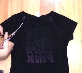 how to cut t shirts into tank tops halter tops in a few easy steps, Cutting the t shirt from under the sleeve