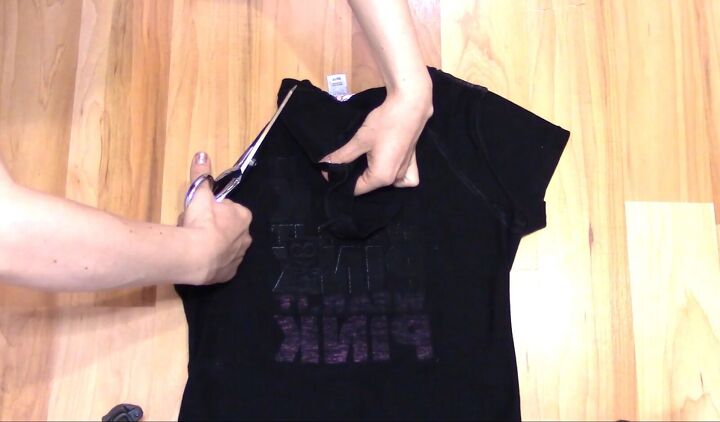 how to cut t shirts into tank tops halter tops in a few easy steps, Flipping the collar over and cutting