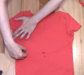 how to cut t shirts into tank tops halter tops in a few easy steps, Drawing a curved line at the back