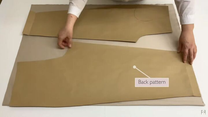 how to sew paperbag waist pants with pockets using a free pattern, Placing the pants pattern on the fabric