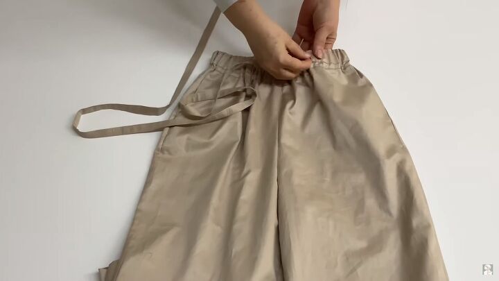 how to sew paperbag waist pants with pockets using a free pattern, Inserting the