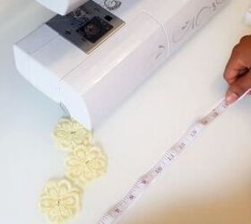 4 quick easy scrap fabric ideas for cute hair accessories, Measuring a piece of elastic