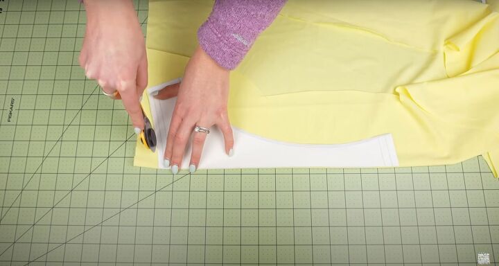 how to sew a swimsuit in a sexy halter wrap style, Cutting out the swimwear fabric with a rotary cutter