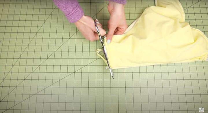 how to sew a swimsuit in a sexy halter wrap style, Trimming the excess fabric