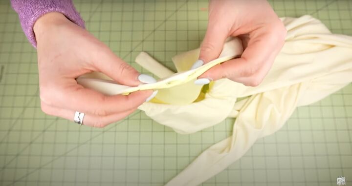 how to sew a swimsuit in a sexy halter wrap style, Hand sewing the opening closed