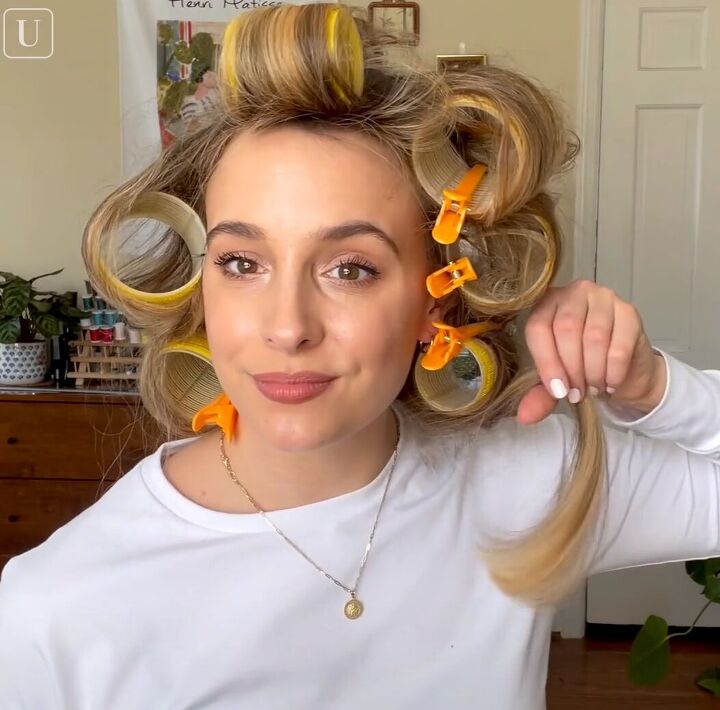 how to use velcro hair rollers to get voluminous bouncy curls, Unrolling the Velcro hair rollers